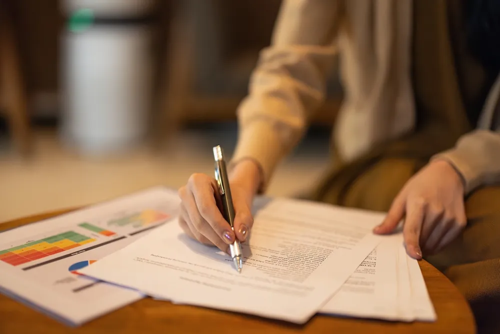 Two colleagues reviewing a grant application